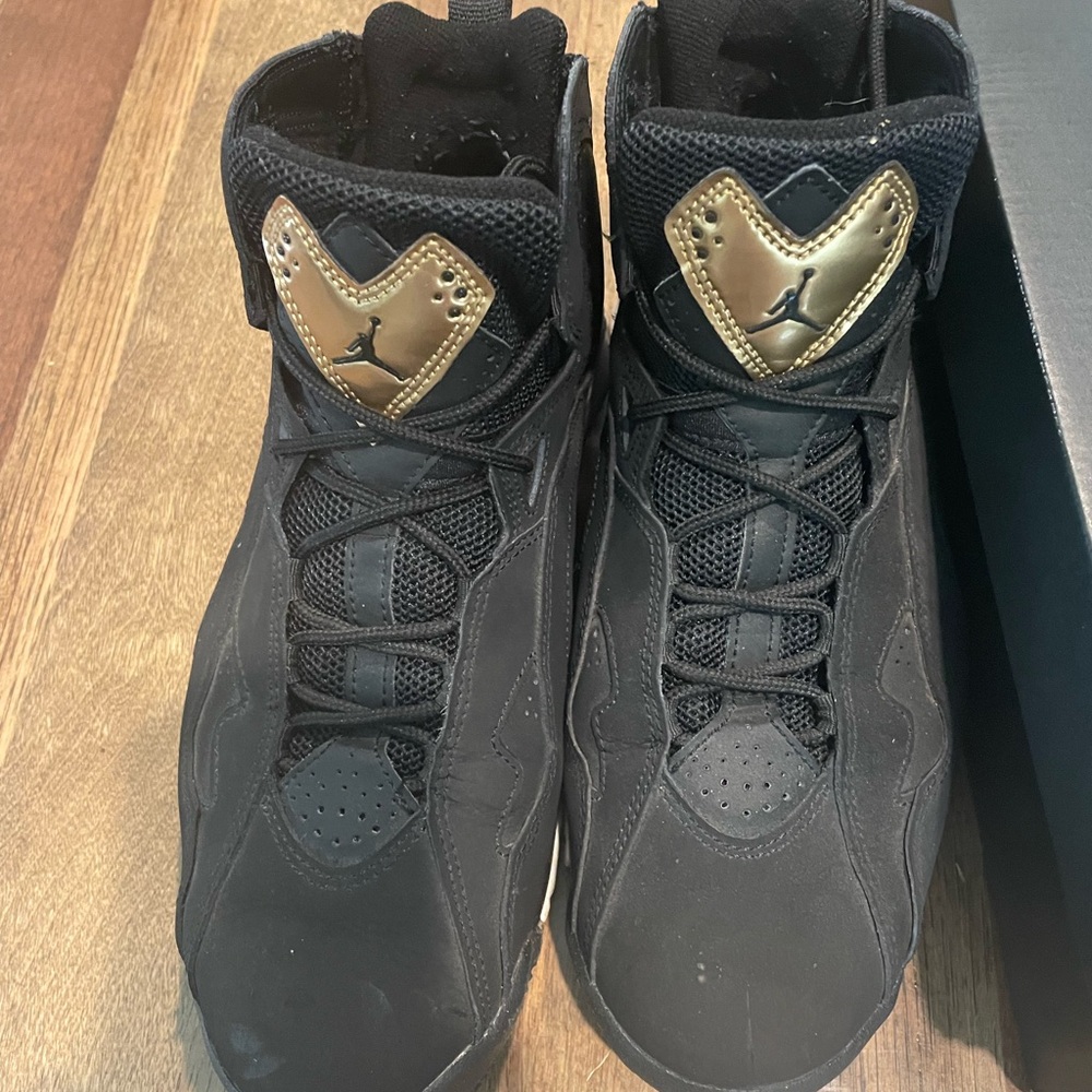 Black and gold Jordan 6